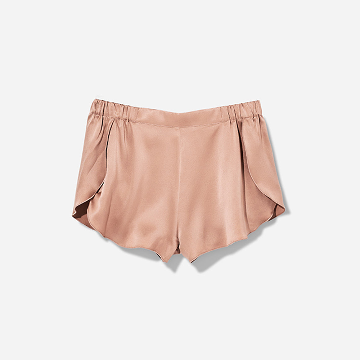 The set includes a sleeveless tee and relaxed-fit shorts, both crafted from breathable silk fabric that is lightweight, comfortable, and machine washable. The shorts feature an elastic waistband for a perfect fit, while the top is designed with a flattering neckline and relaxed fit that drapes beautifully on the body.