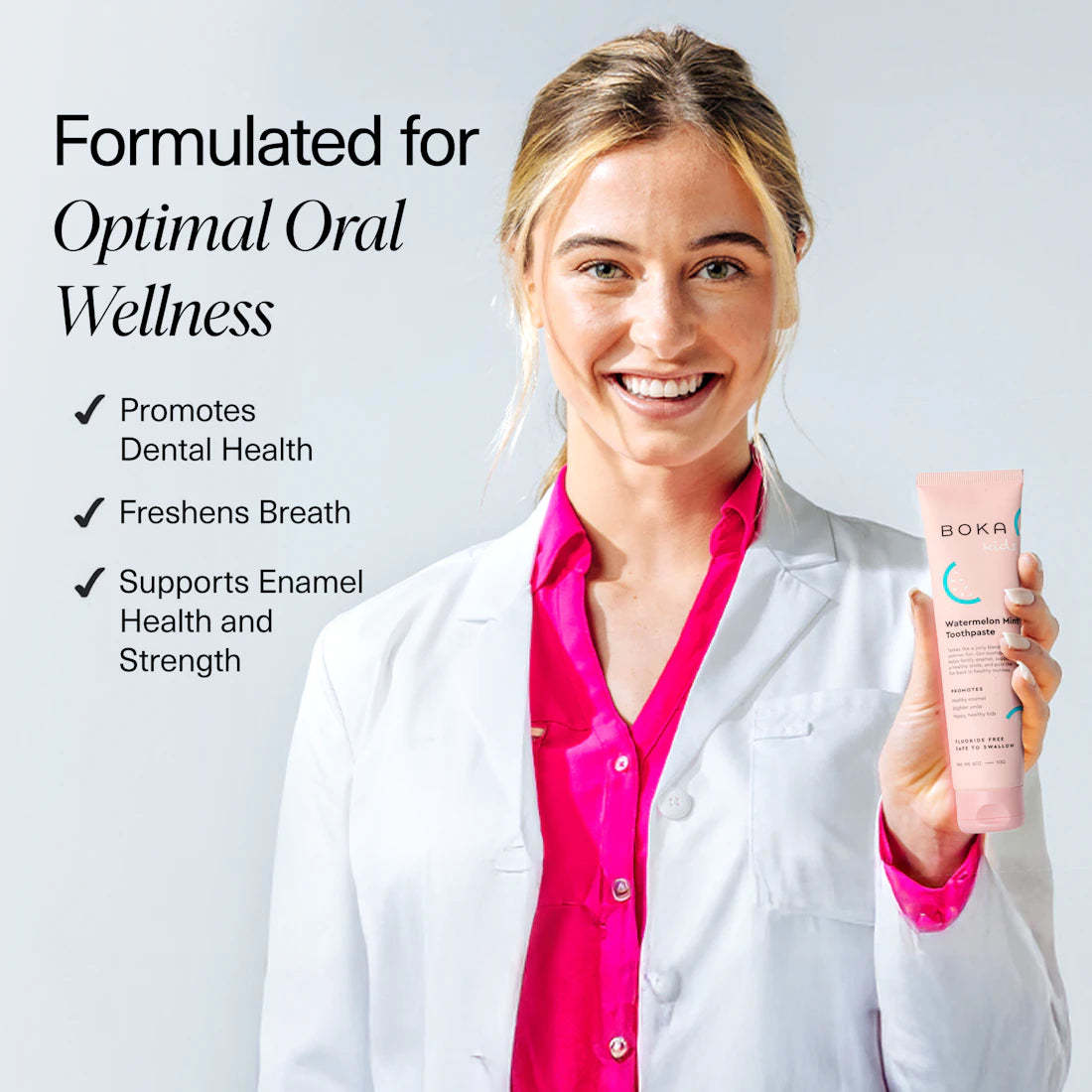 Smiling woman in lab coat holds n-Ha Toothpaste Family 3 Pack; text highlights nano-hydroxyapatite benefits.