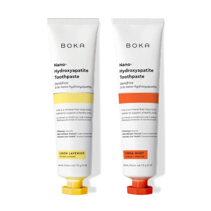N-Ha Toothpaste 2-Pack with nano-hydroxyapatite to strengthen enamel on a black background.