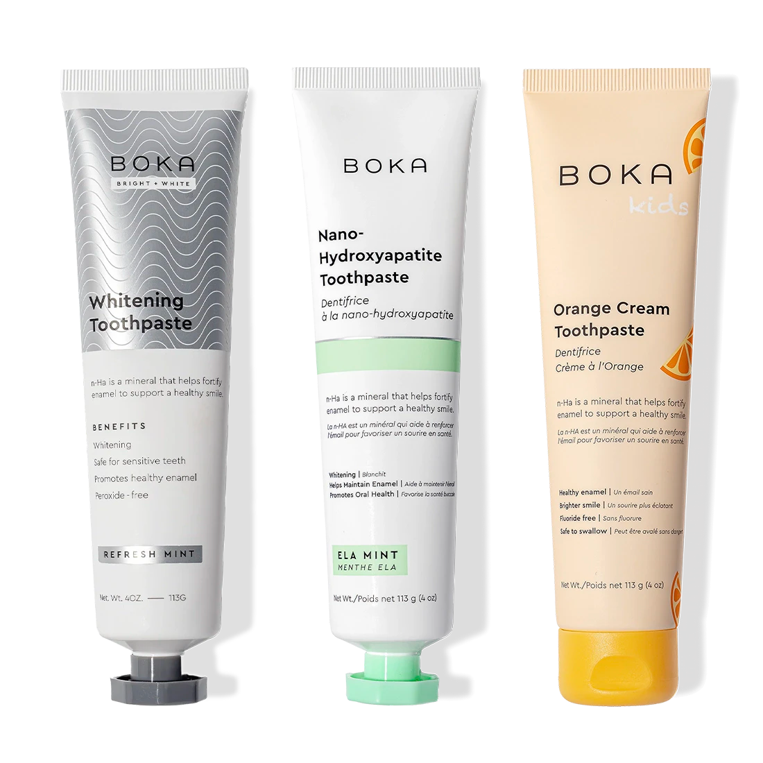 Gallery view - Three-pack of Boka Nano (n-Ha) Whitening Toothpaste, including Refresh Mint and Kids Orange Cream.