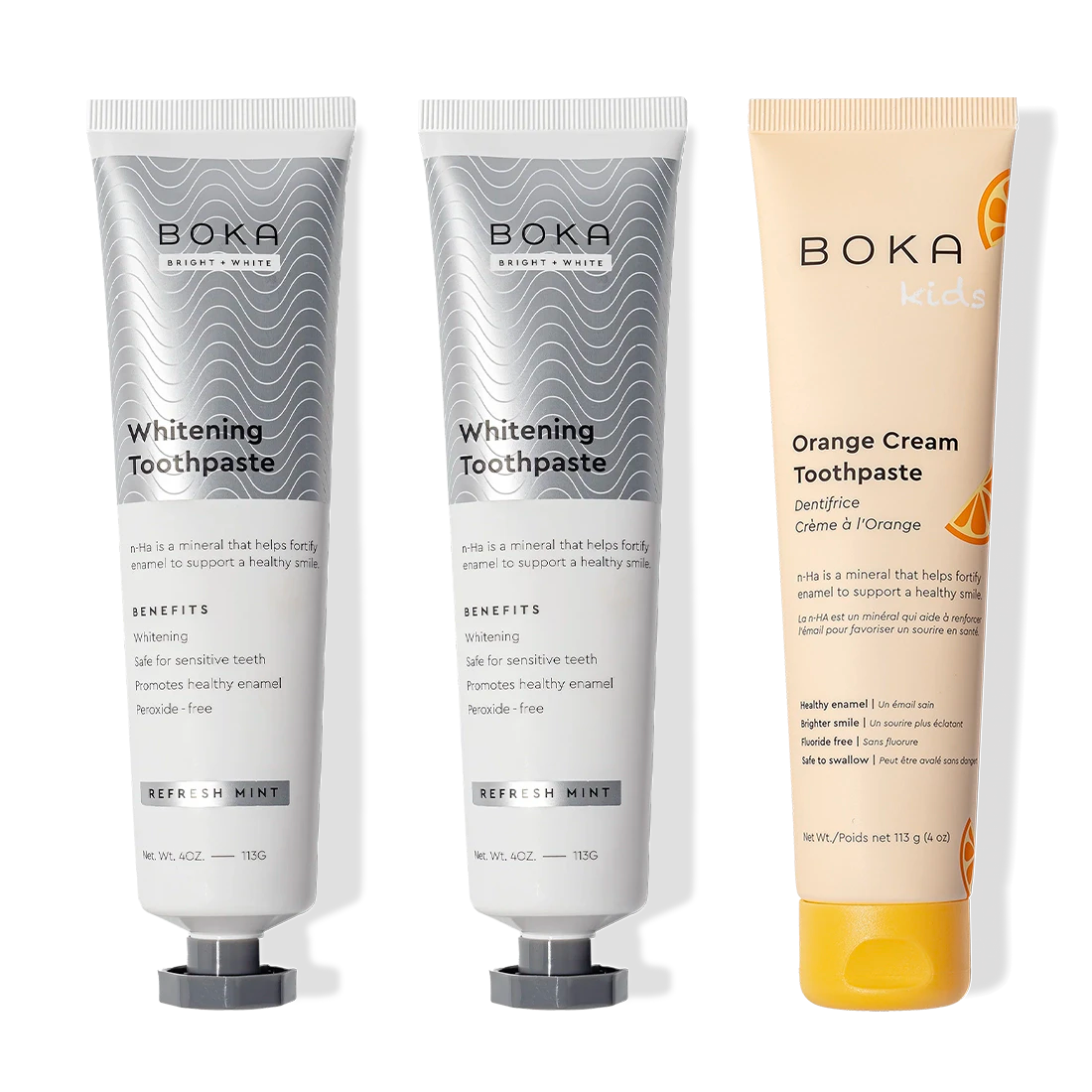 Three Nano (n-Ha) Toothpaste: two whitening (gray), one kids orange cream (orange).