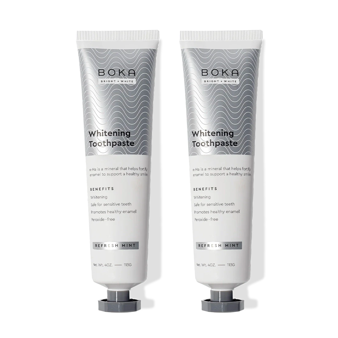 Two tubes of Refresh Mint Whitening n-Ha Toothpaste for sensitive teeth.