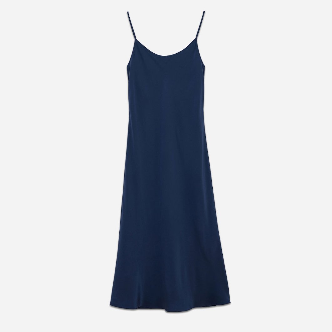 The Midi Slip features an elegant and timeless design that effortlessly flatters your figure. With its adjustable spaghetti straps and gently flared silhouette, this slip drapes beautifully, providing a graceful and feminine look. The midi length offers just the right balance of coverage and allure, making it suitable for both lounging and bedtime.