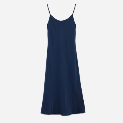 The Midi Slip features an elegant and timeless design that effortlessly flatters your figure. With its adjustable spaghetti straps and gently flared silhouette, this slip drapes beautifully, providing a graceful and feminine look. The midi length offers just the right balance of coverage and allure, making it suitable for both lounging and bedtime.