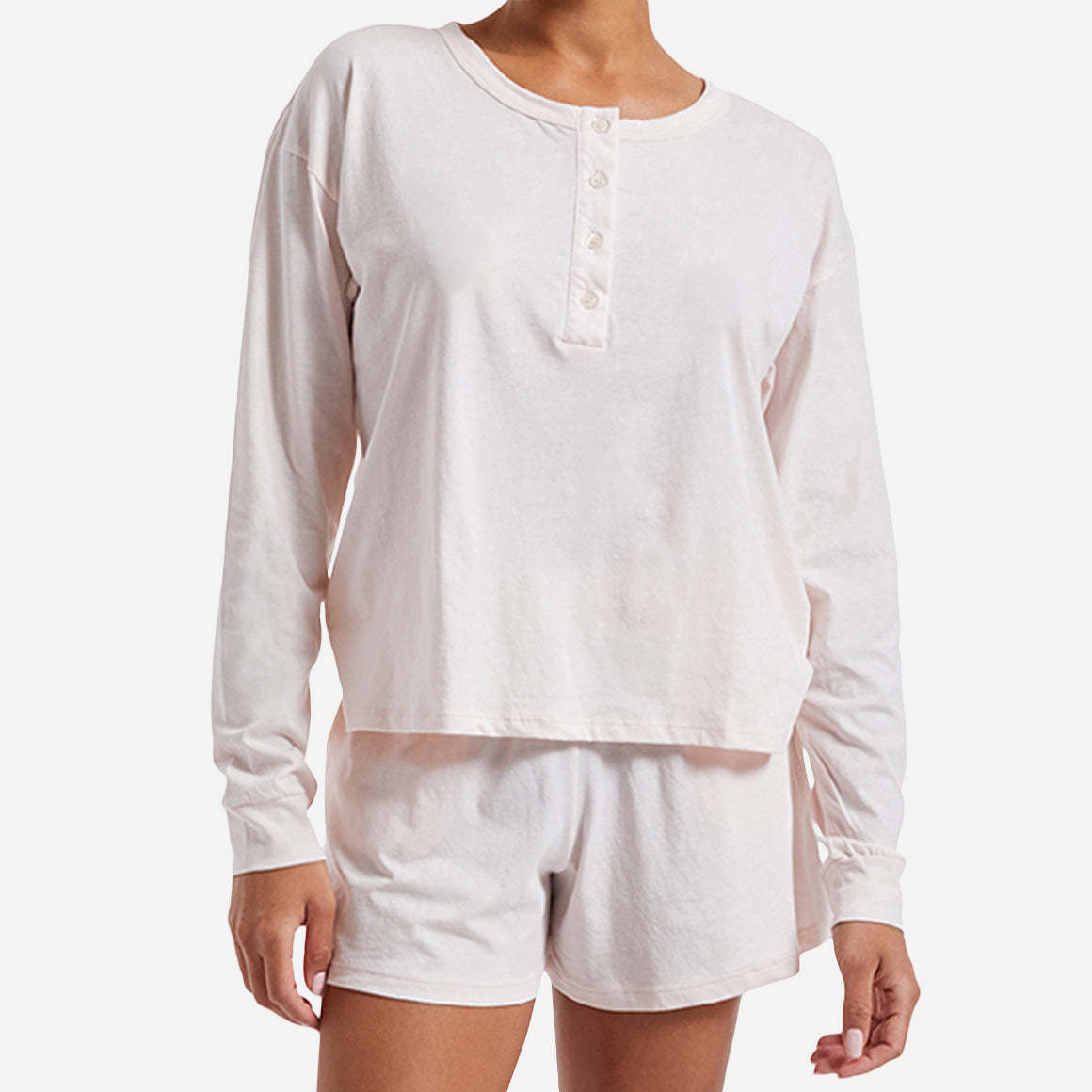 The design of the Chloe PJ Set is as elegant as it is versatile. The classic long sleeve henley shirt features a relaxed fit and a flattering neckline. The cozy shorts offer a comfortable, yet flattering silhouette, with side seam pockets and an elastic waistband ensuring a personalized fit for all body types.