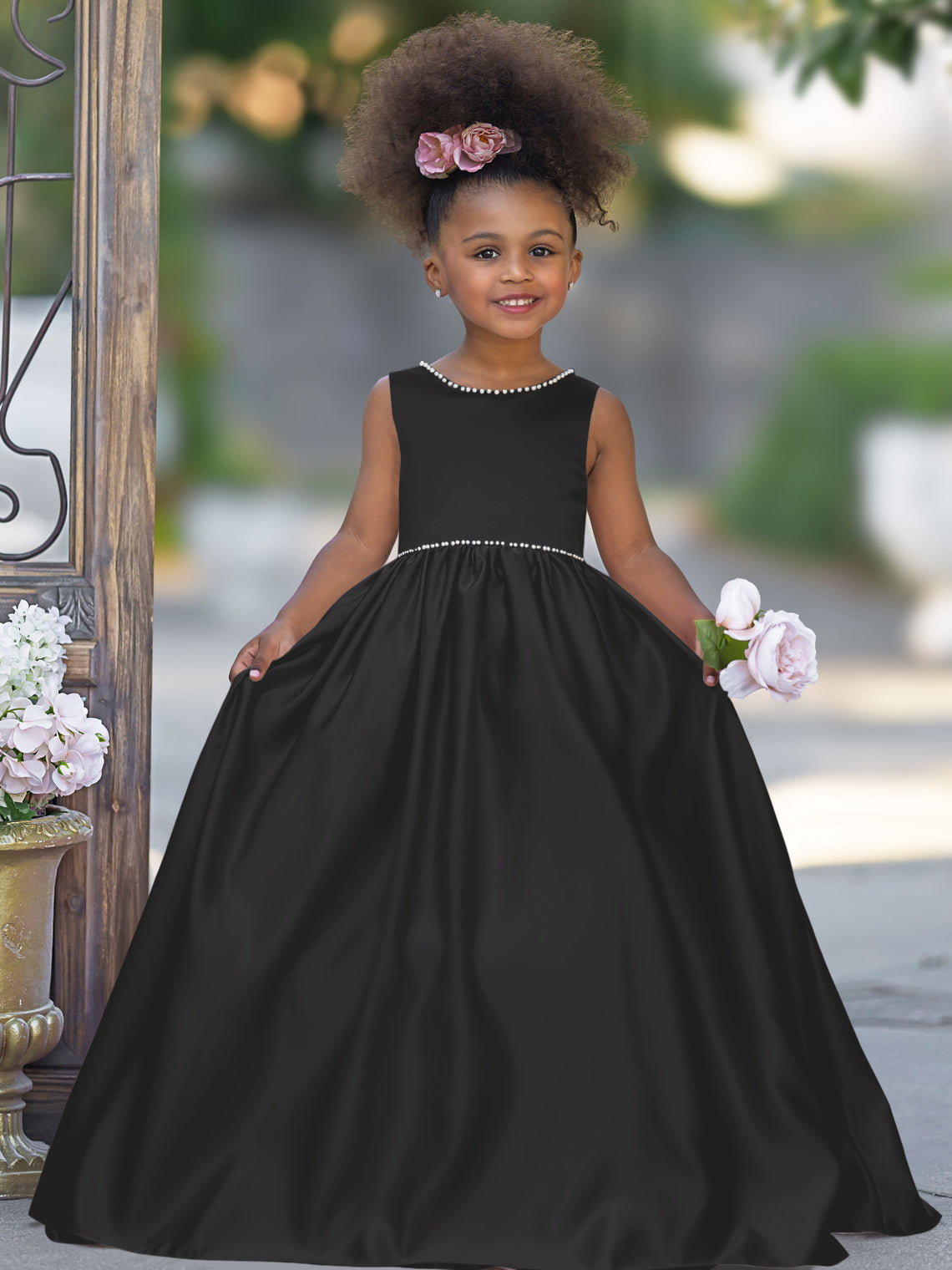 Satin dress with beaded neckline and bow detail in pink sleeveless