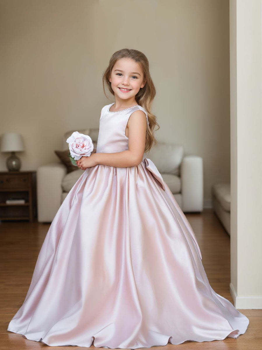 Satin dress with beaded neckline and bow detail in pink sleeveless