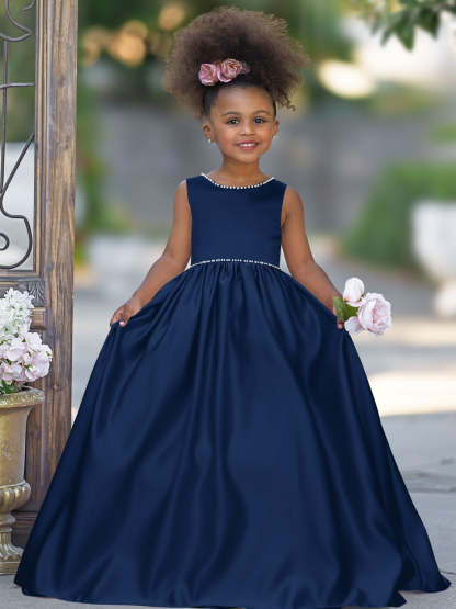 Satin dress with beaded neckline and bow detail in pink sleeveless