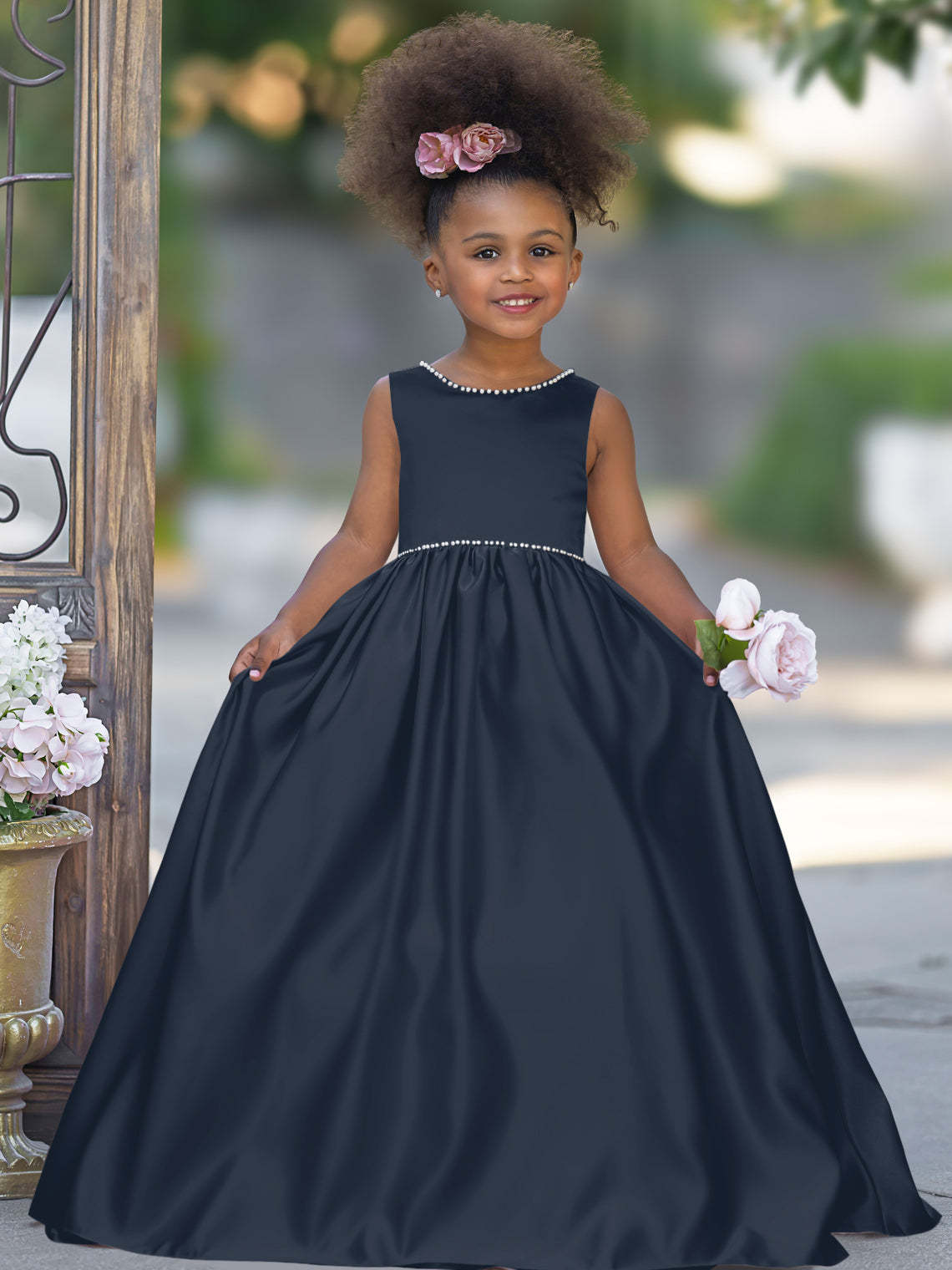 Satin dress with beaded neckline and bow detail in pink sleeveless