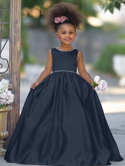 Satin dress with beaded neckline and bow detail in pink sleeveless