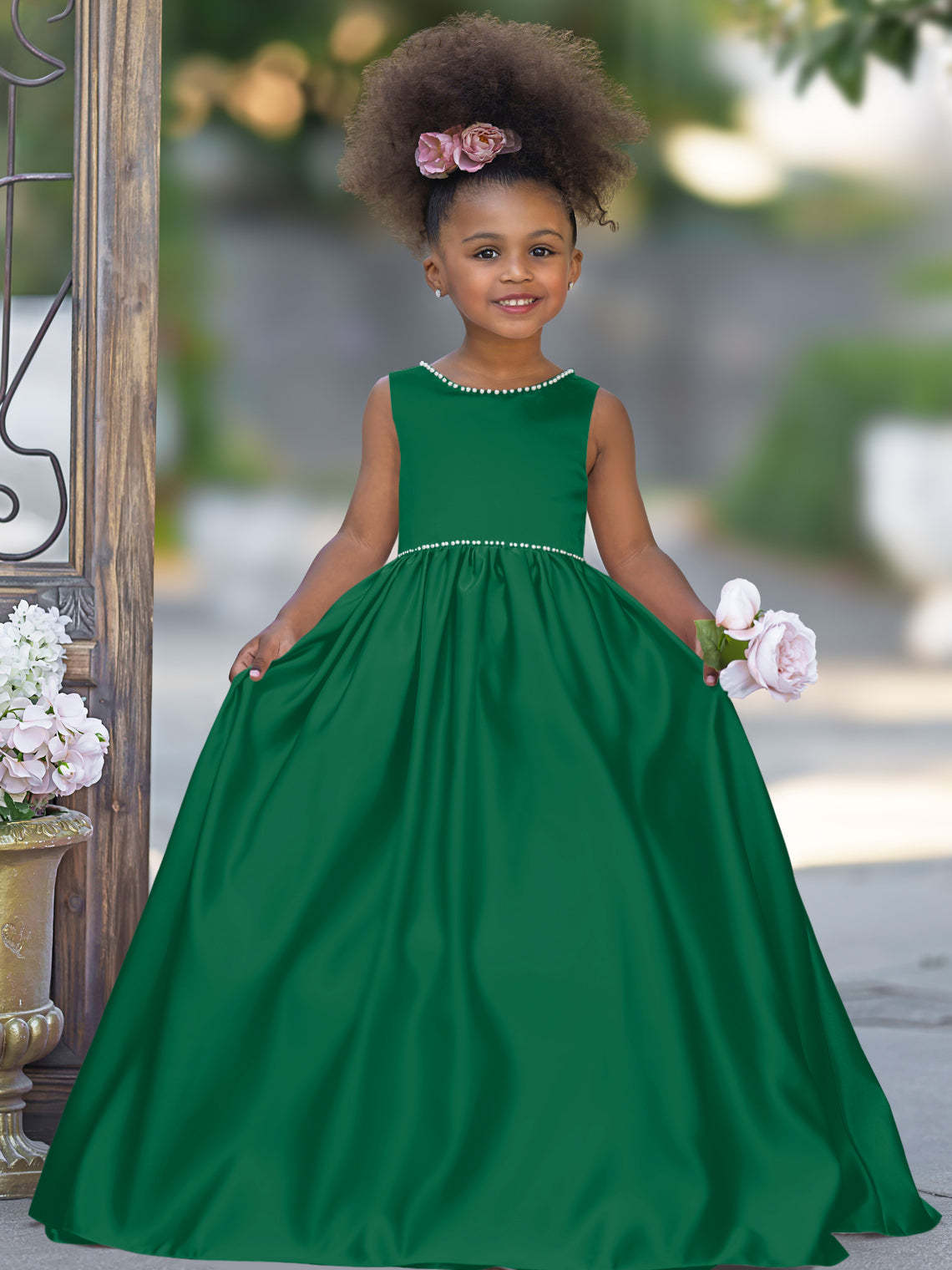 Satin dress with beaded neckline and bow detail in pink sleeveless