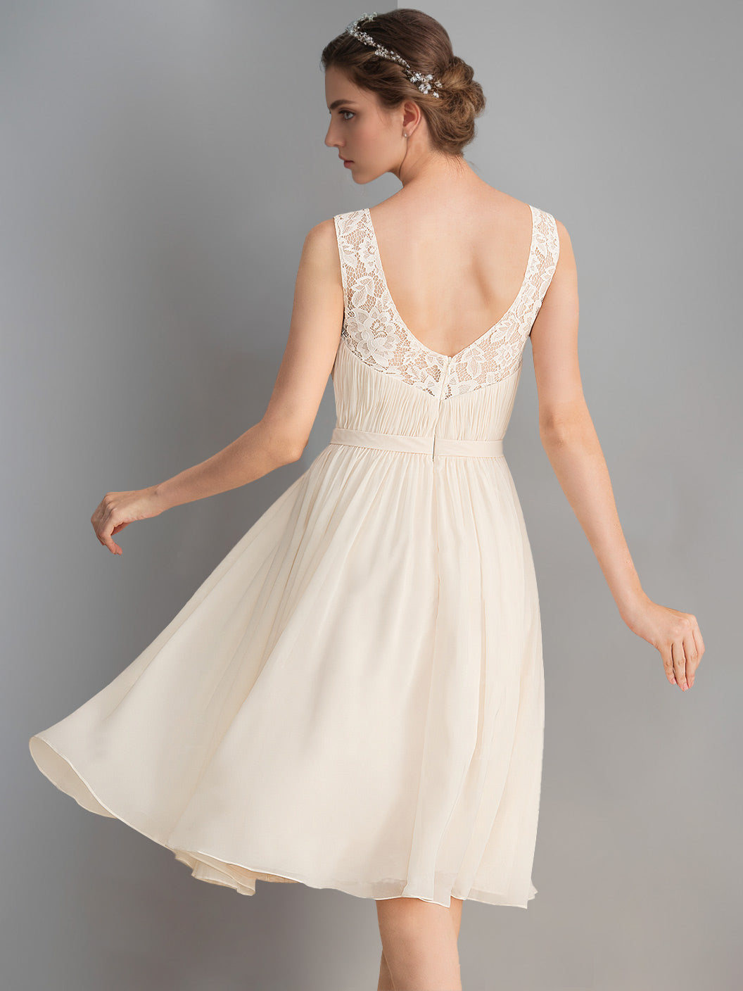 Sleeveless Knee-Length A-Line Wedding Dress with Deep V-Neck and Ruched Details
