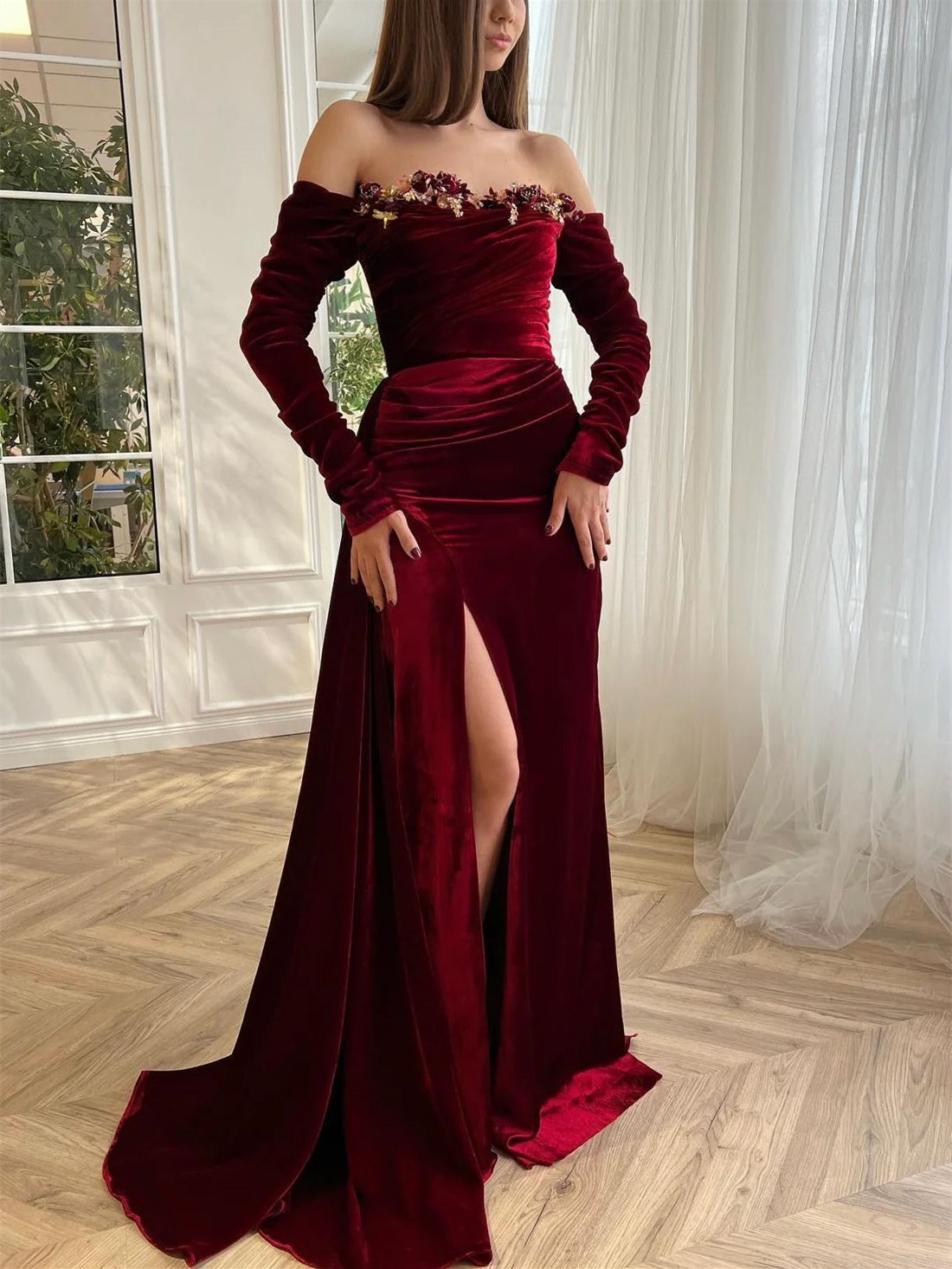 Luxury velvet evening gown with off-the-shoulder long sleeves