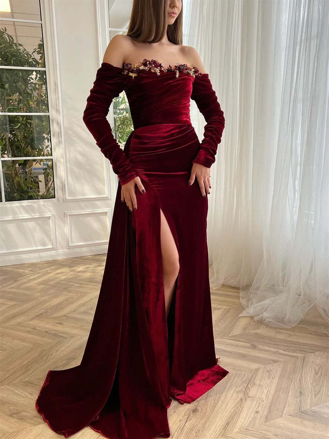 Luxury velvet evening gown with off-the-shoulder long sleeves