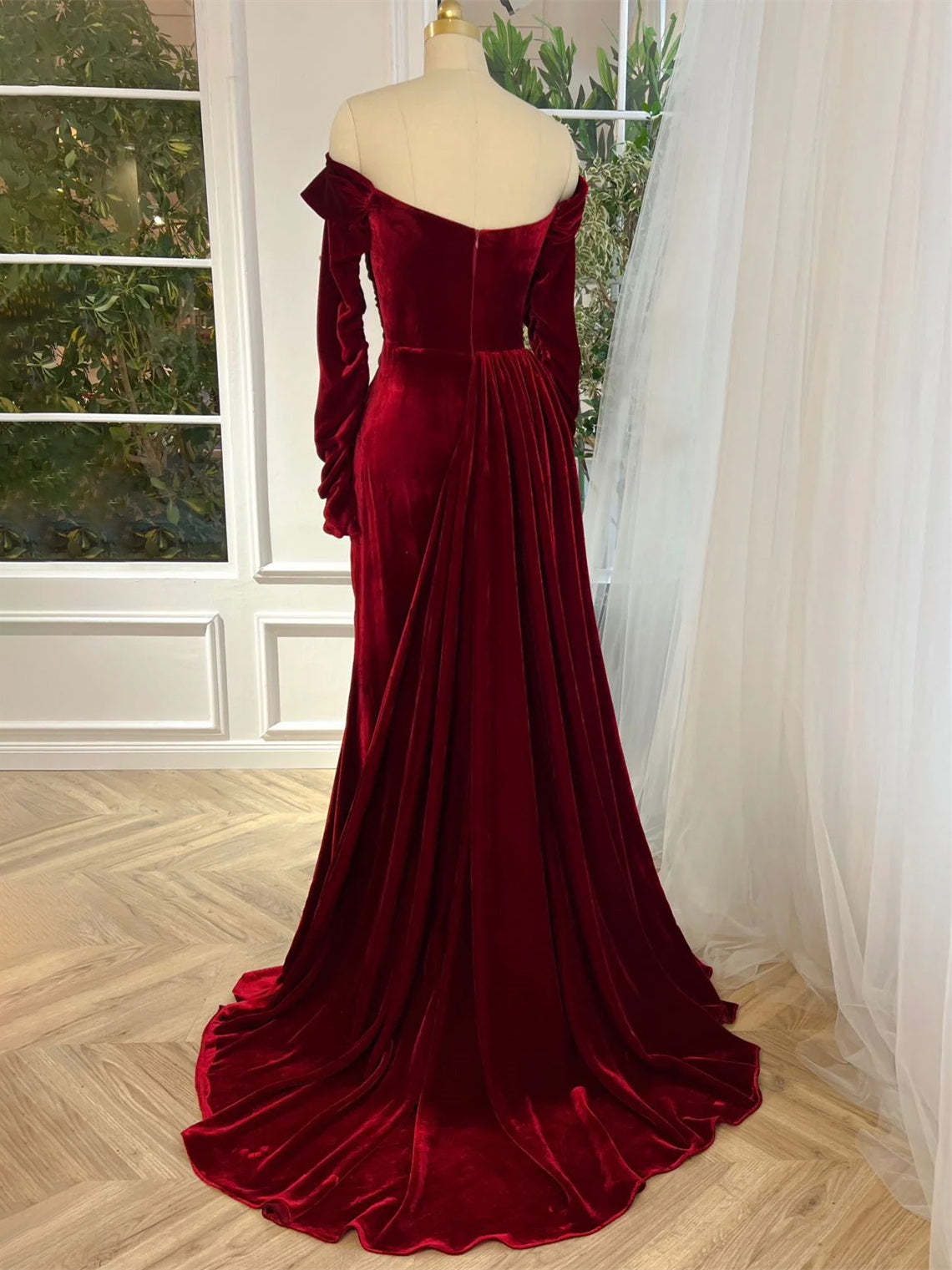 Luxury velvet evening gown with off-the-shoulder long sleeves