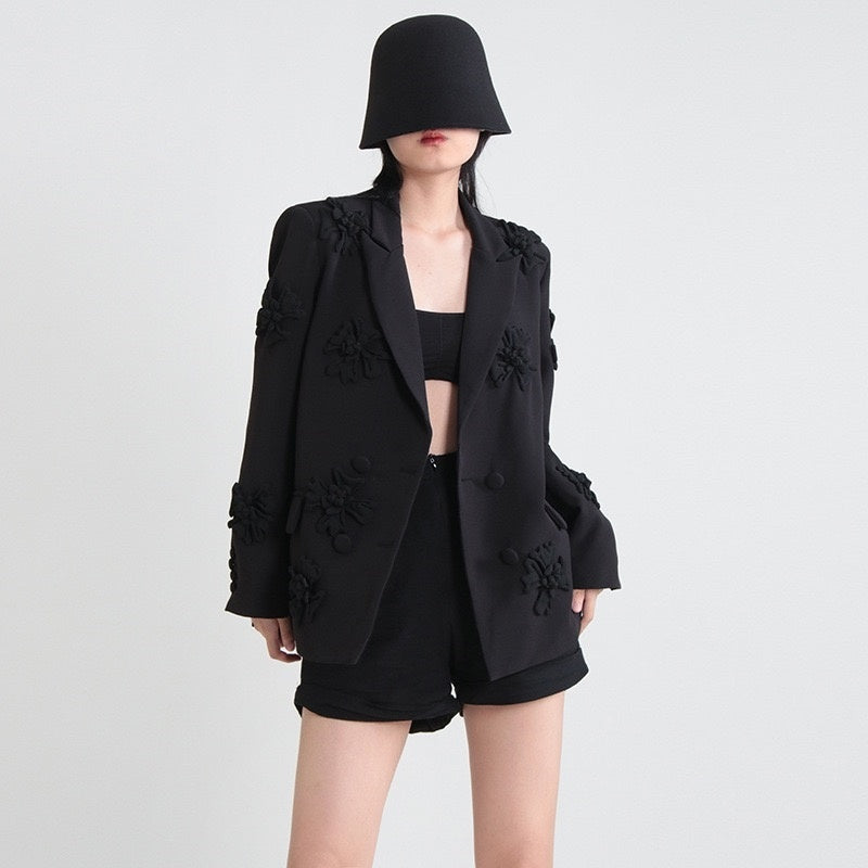 Fuchsia double-breasted blazer for women featuring peak lapels and floral details