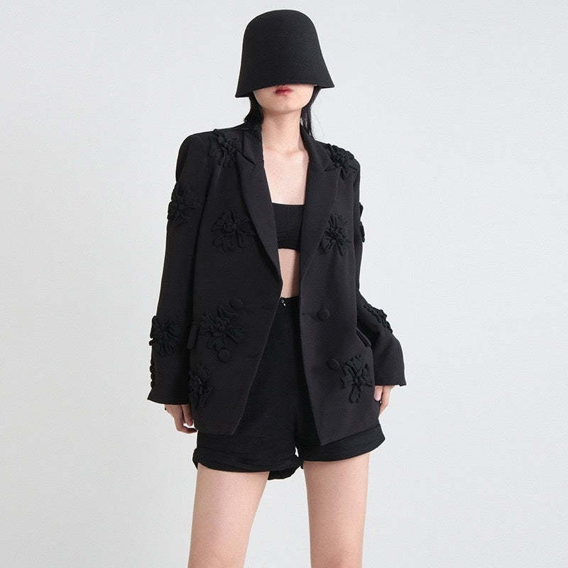 Fuchsia double-breasted blazer for women featuring peak lapels and floral details