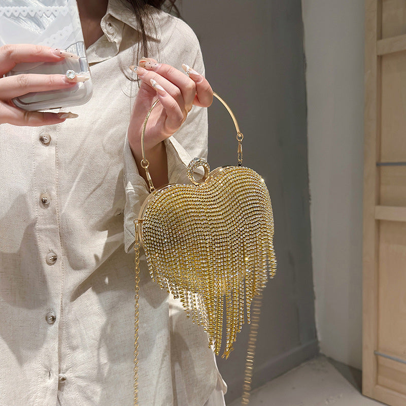 Elegant High-End Gold PVC Heart Clutch Bag with Crystal Tassel for Daily or Wedding Use