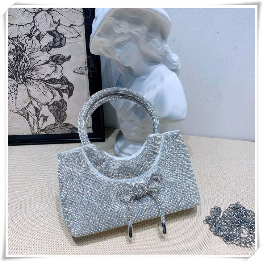 Elegant Silver Crystal Clutch Bag with Bowknot for Weddings and Parties