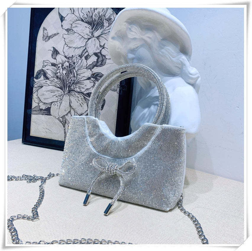 Elegant Silver Crystal Clutch Bag with Bowknot for Weddings and Parties