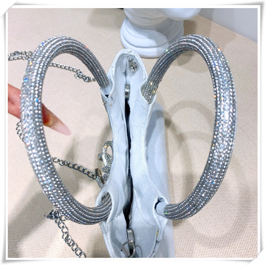 Elegant Silver Crystal Clutch Bag with Bowknot for Weddings and Parties
