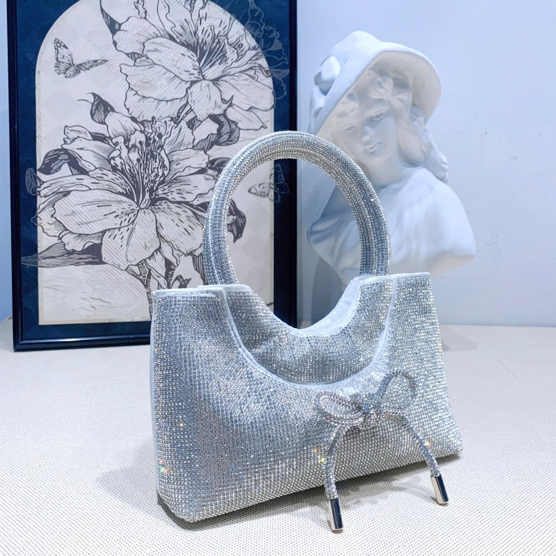 Elegant Silver Crystal Clutch Bag with Bowknot for Weddings and Parties