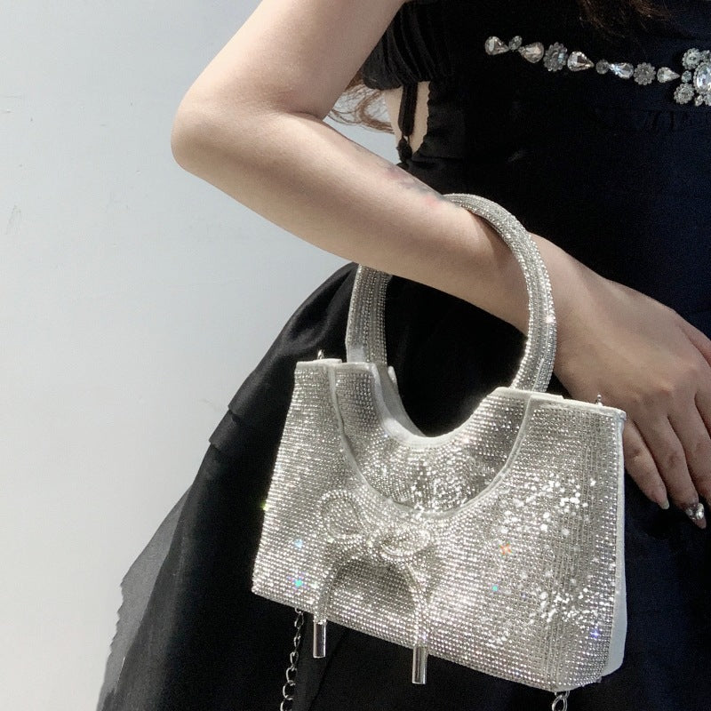 Elegant Silver Crystal Clutch Bag with Bowknot for Weddings and Parties