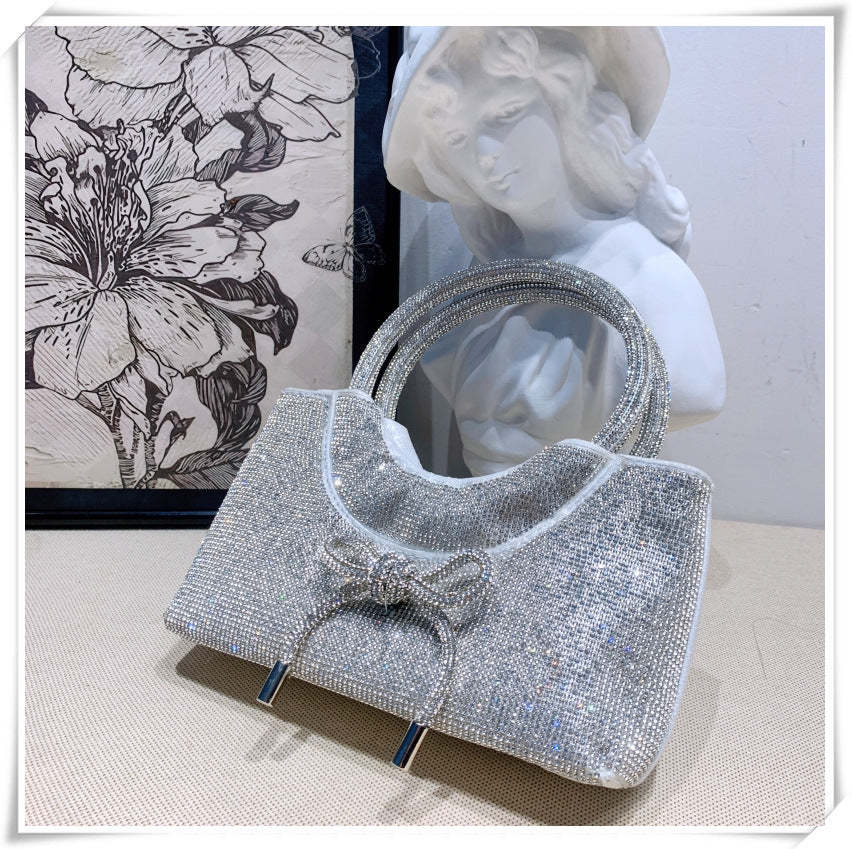 Elegant Silver Crystal Clutch Bag with Bowknot for Weddings and Parties