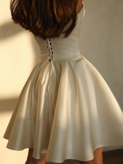 Short Strapless Satin Wedding Dress in A-Line/Princess Style Featuring Pockets