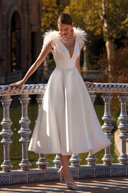 Elegant V-Neck A-Line Princess Wedding Dress with Feather Details in Tea-Length