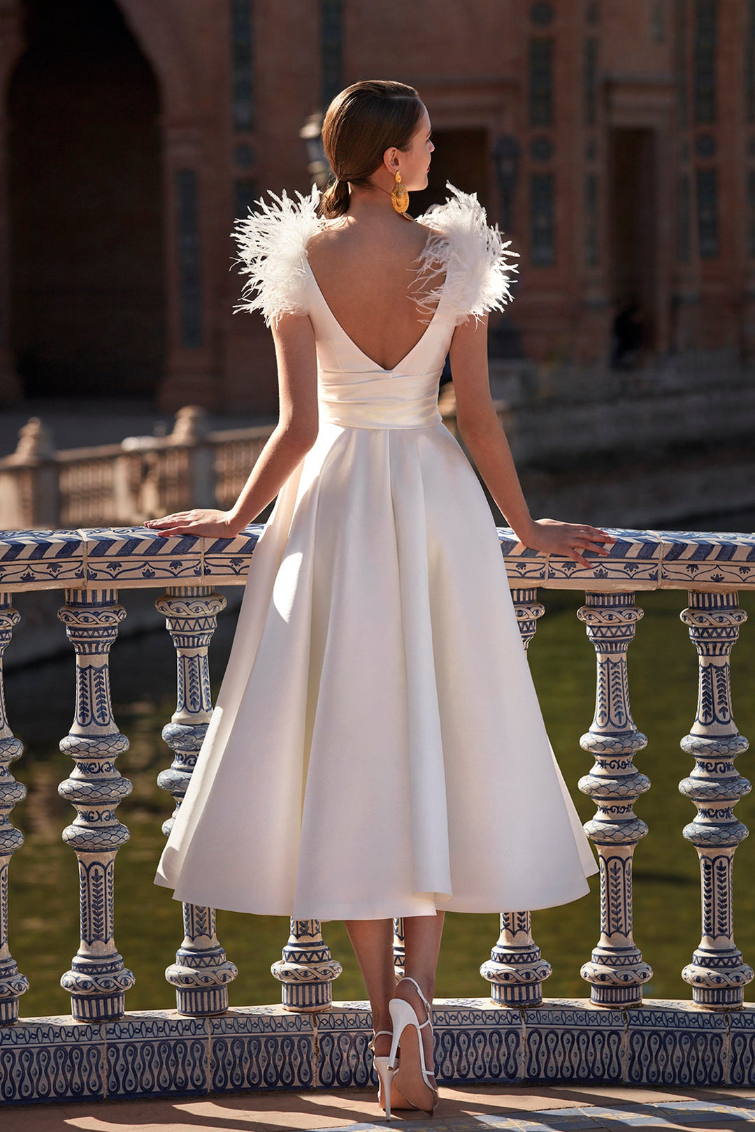Elegant V-Neck A-Line Princess Wedding Dress with Feather Details in Tea-Length