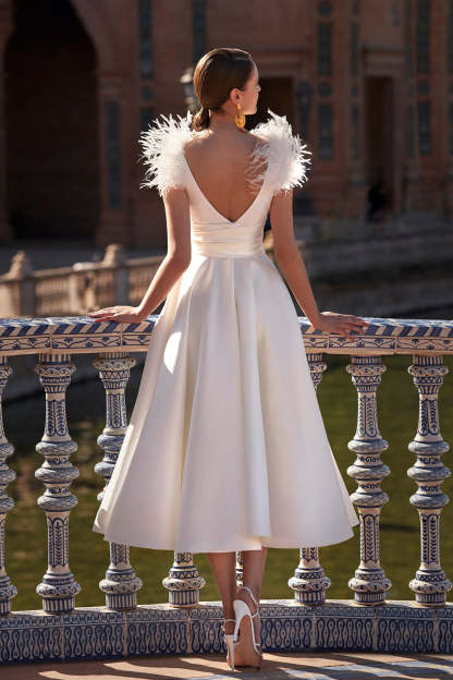 Elegant V-Neck A-Line Princess Wedding Dress with Feather Details in Tea-Length