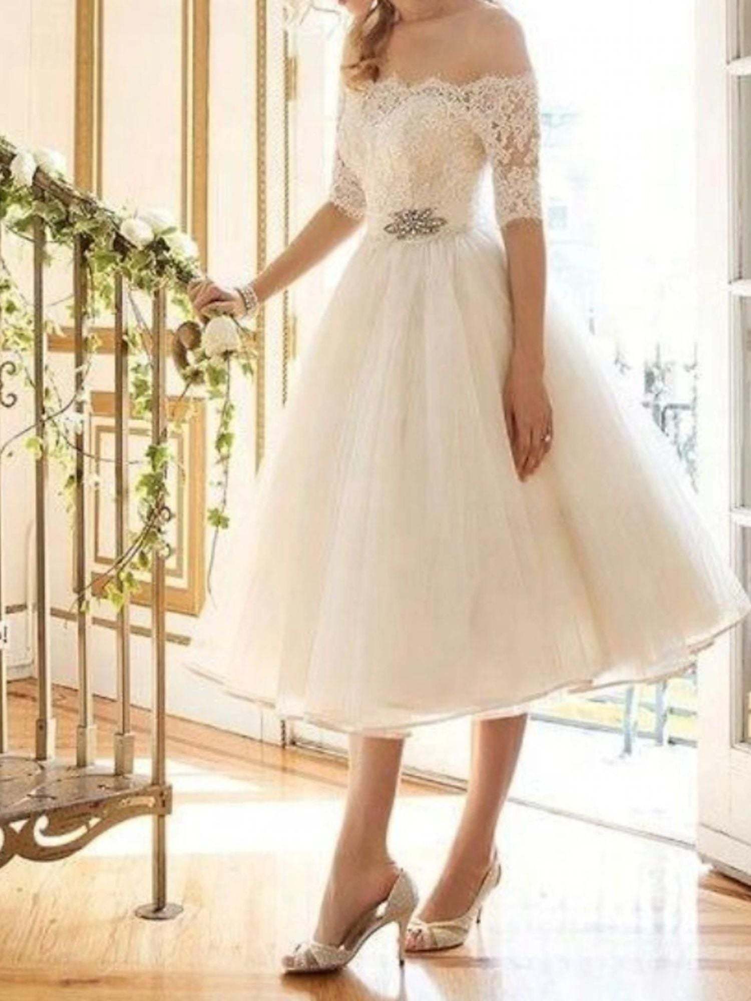 Off-the-shoulder A-Line Princess Wedding Dress with Lace Tulle Half Sleeves and Tea Length Appliques