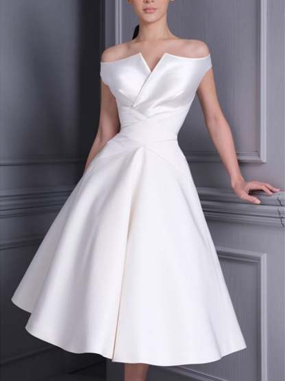 Luxurious Off-the-Shoulder A-Line Wedding Dress with Short Sleeves and Ruffle Detail in Tea Length
