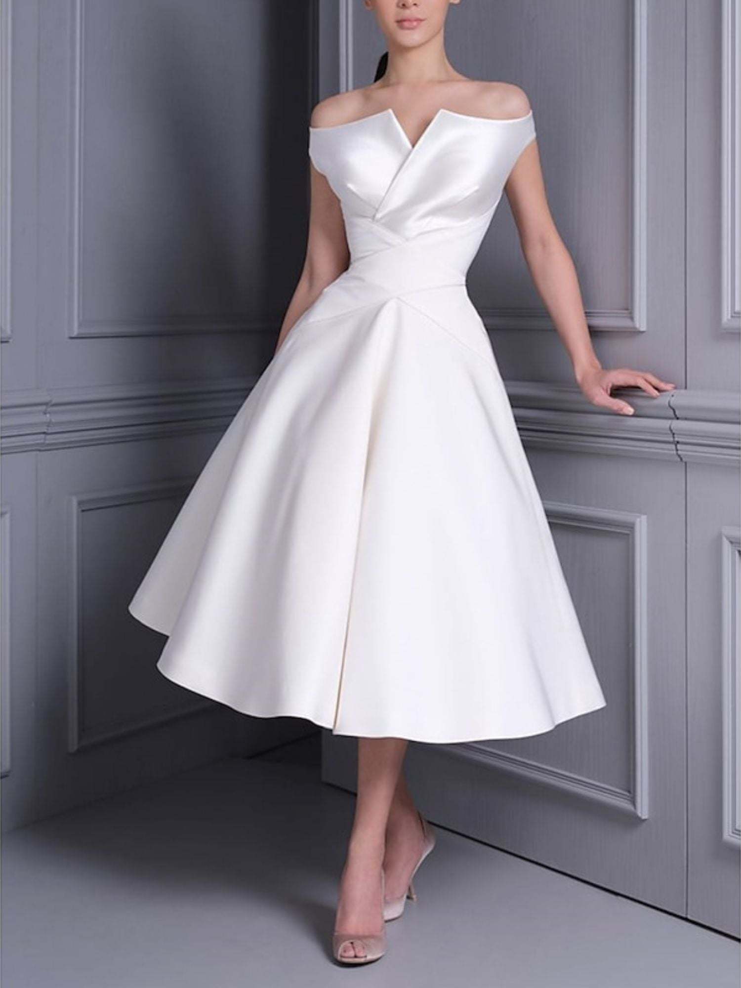 Luxurious Off-the-Shoulder A-Line Wedding Dress with Short Sleeves and Ruffle Detail in Tea Length