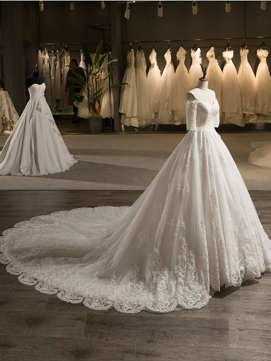 Off-the-Shoulder A-Line Princess Wedding Dresses in Tulle with Half Sleeves and Lace Appliques