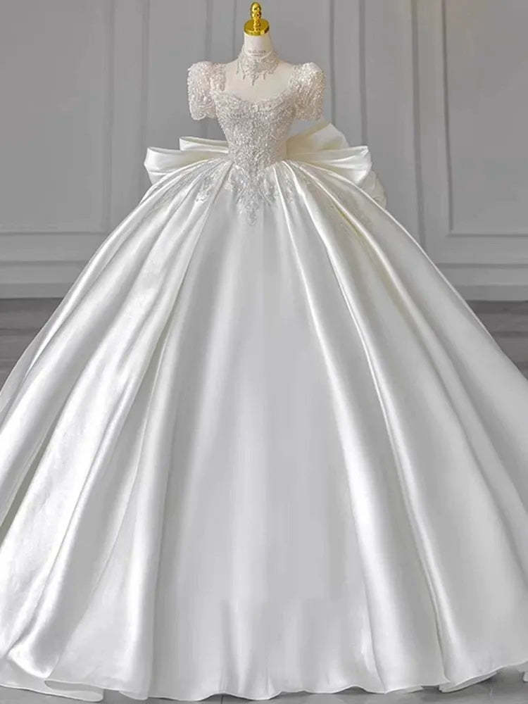 Sweetheart Short-Sleeve Ball Gown Wedding Dress with Lace Appliques, Beads & Oversized Bow