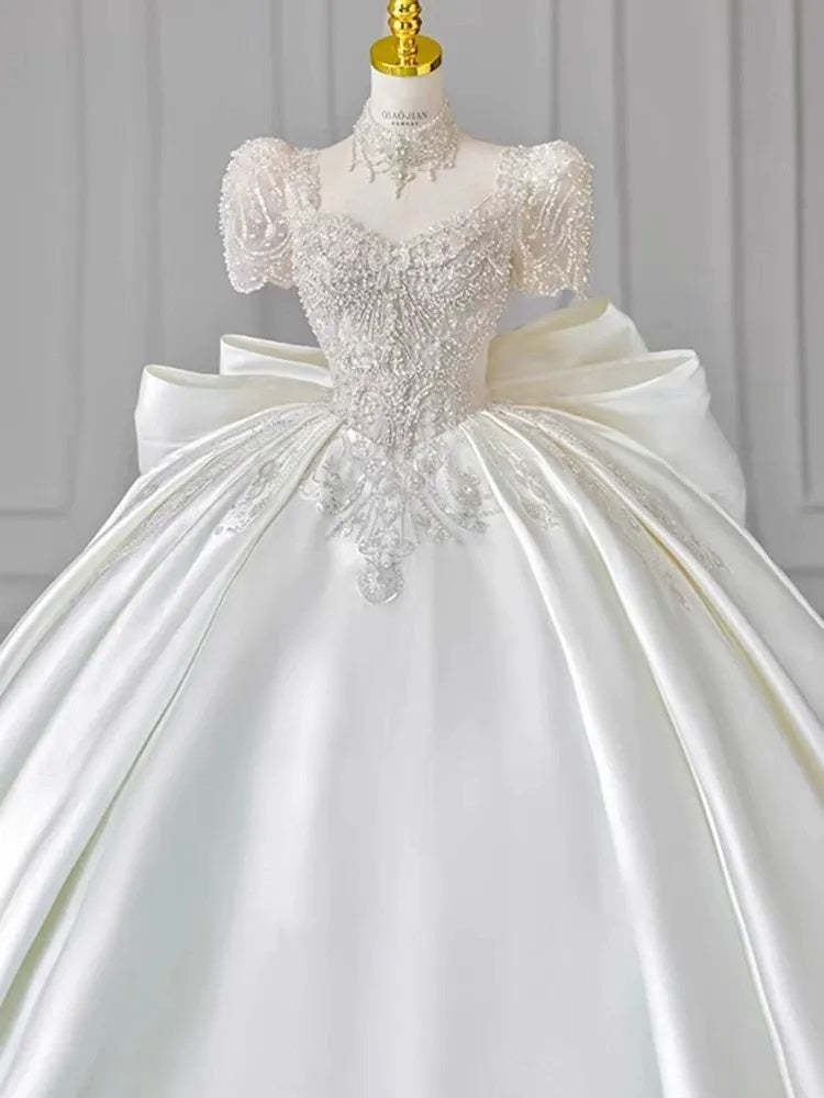 Sweetheart Short-Sleeve Ball Gown Wedding Dress with Lace Appliques, Beads & Oversized Bow
