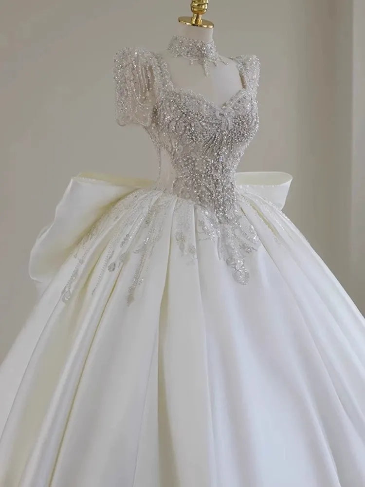 Sweetheart Short-Sleeve Ball Gown Wedding Dress with Lace Appliques, Beads & Oversized Bow