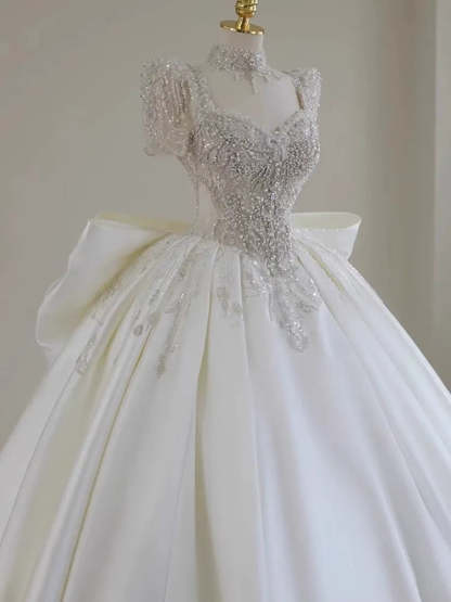 Sweetheart Short-Sleeve Ball Gown Wedding Dress with Lace Appliques, Beads & Oversized Bow