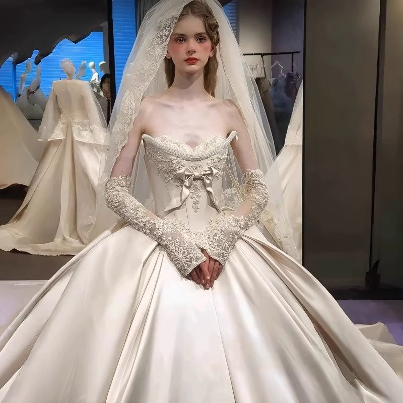 Off-The-Shoulder Pleated Ball Gown Wedding Dresses with Jewel Appliques, Bow & Detachable Sleeves