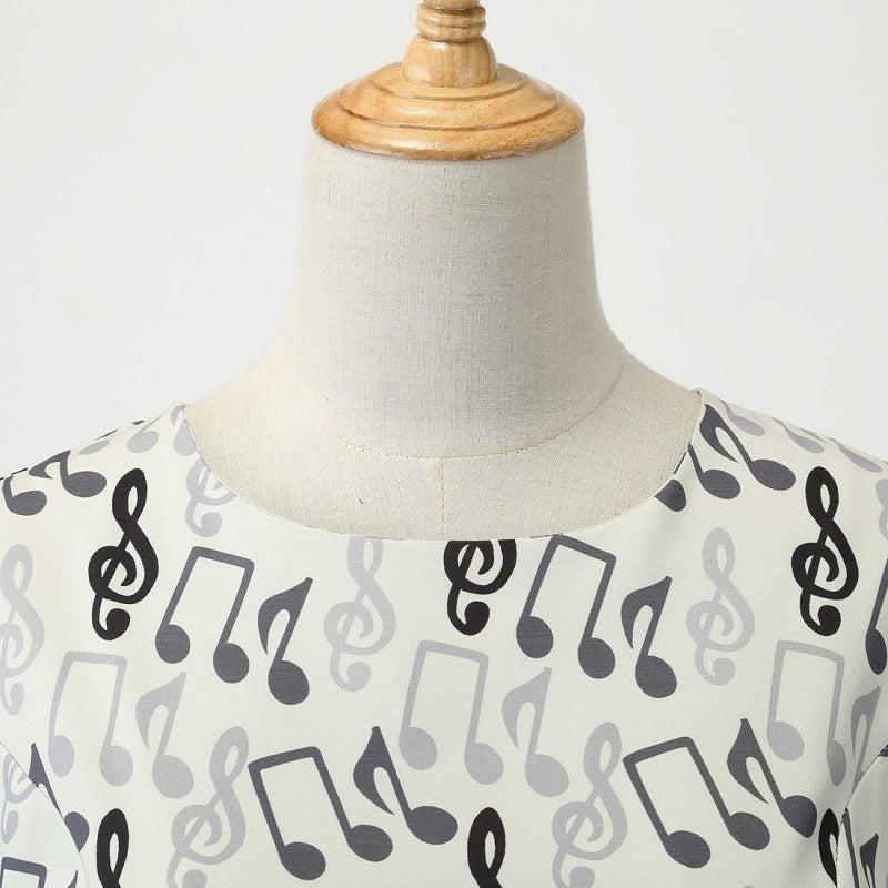 Vintage 1950s A-Line Princess Dress with Scoop Neck and Short Sleeves Featuring a Bow Sash