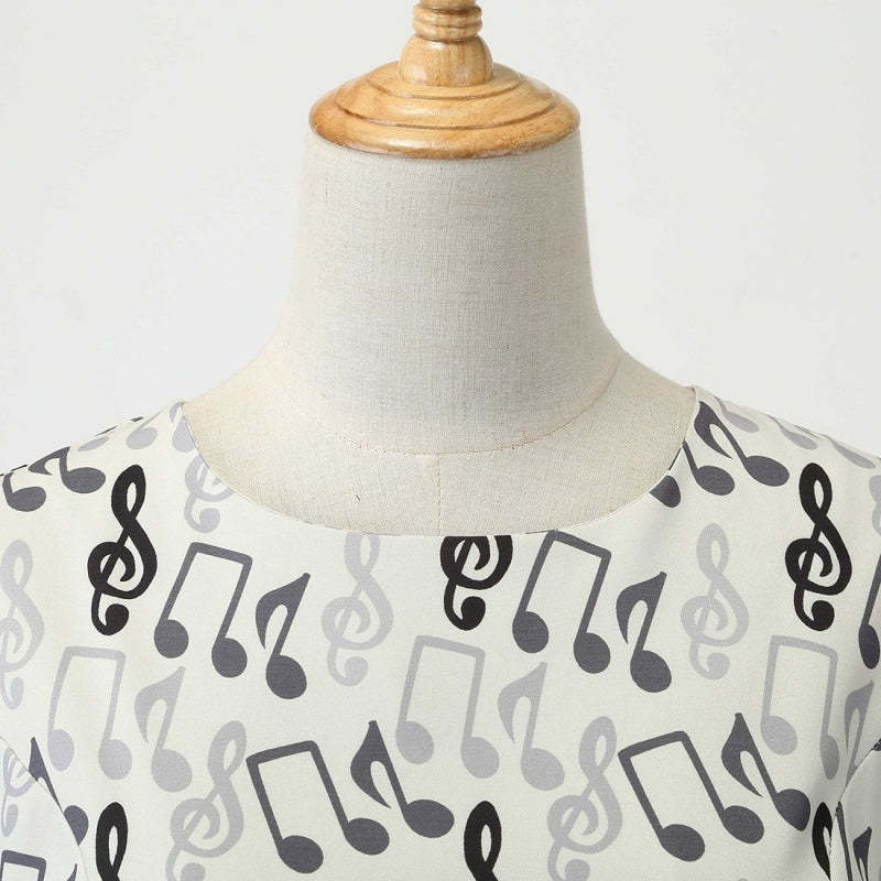 Vintage 1950s A-Line Princess Dress with Scoop Neck and Short Sleeves Featuring a Bow Sash