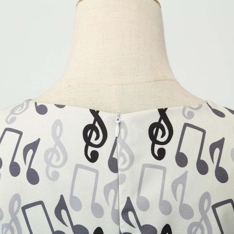 Vintage 1950s A-Line Princess Dress with Scoop Neck and Short Sleeves Featuring a Bow Sash