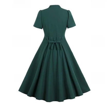 Vintage 1950s A-Line Princess Dress with V-Neck Short Sleeves Ruched Detail Pleats Bow and Buttons