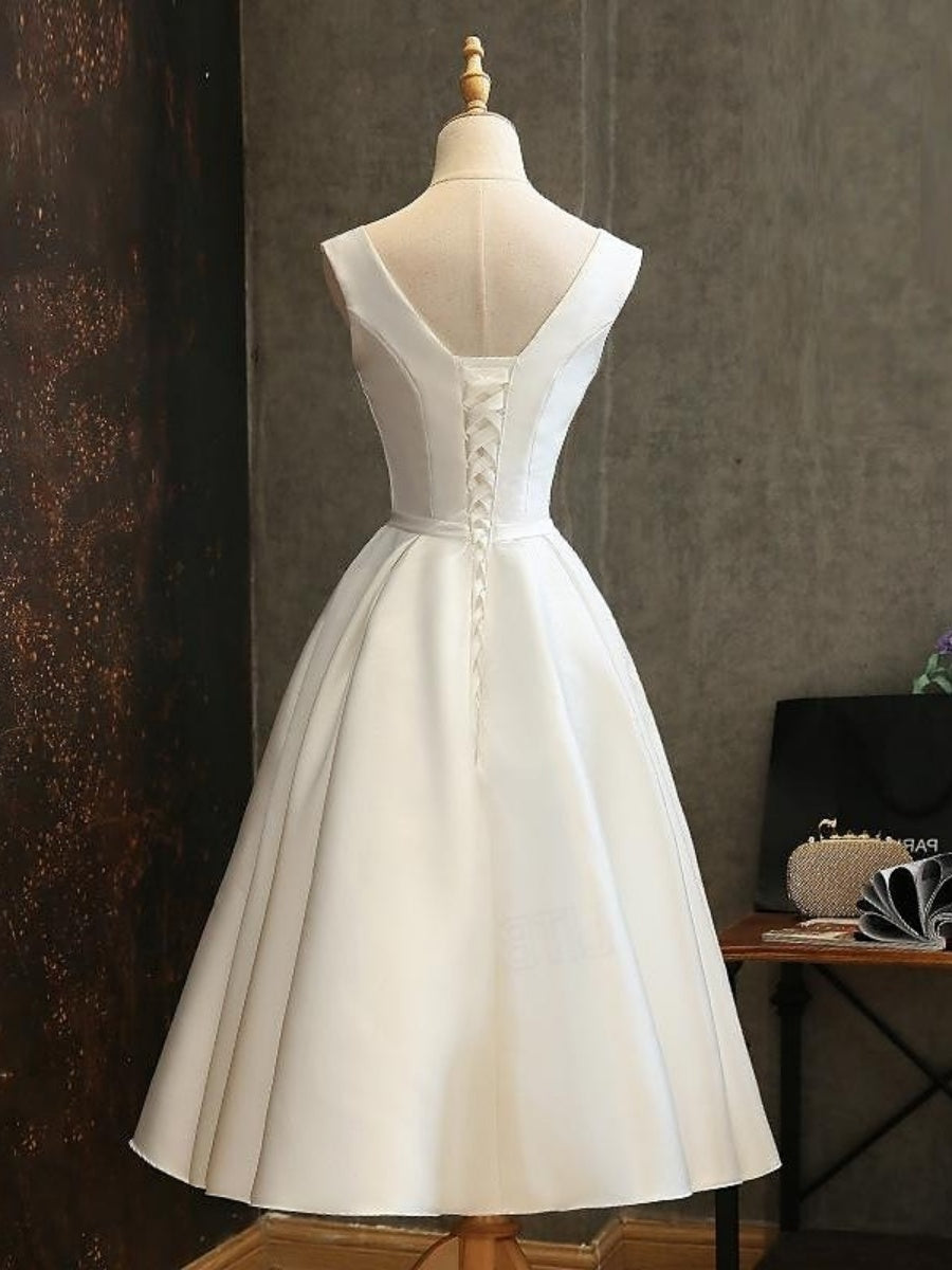 Vintage 1950s Pleated Sleeveless A-Line Dress with V-Neck and Bow Belt