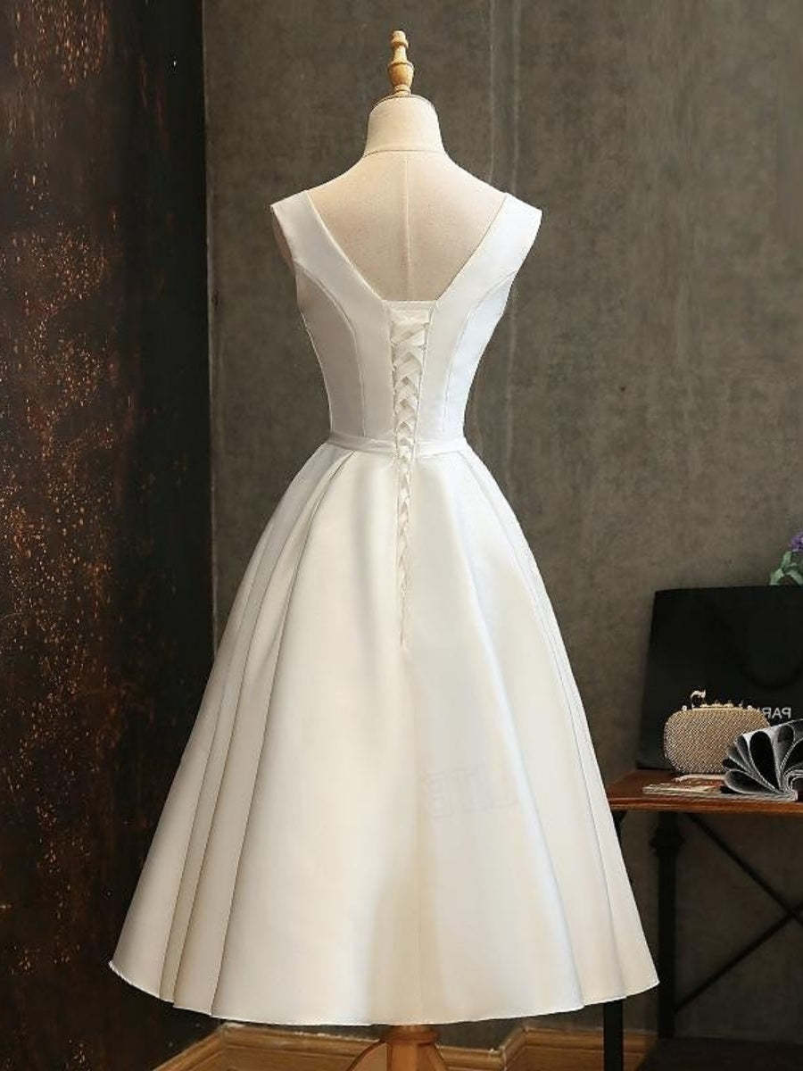 Vintage 1950s Pleated Sleeveless A-Line Dress with V-Neck and Bow Belt