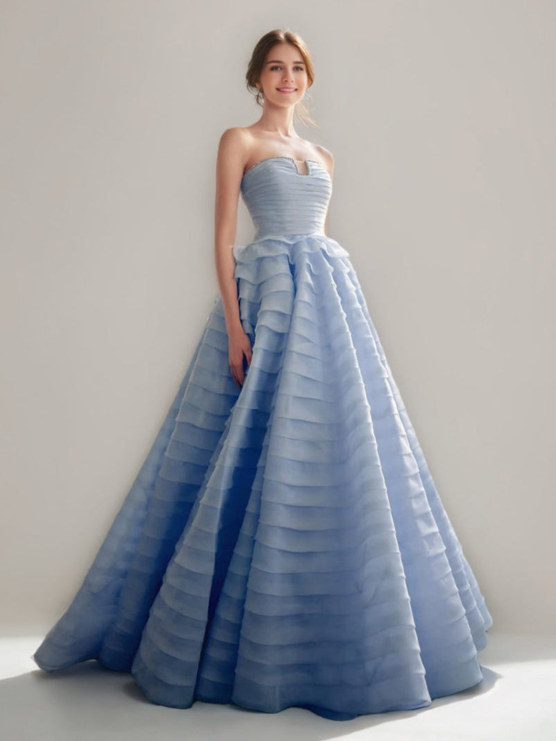 Elegant Strapless Ball Gown with Tiered Floor-Length Design and Lace-up Crystals