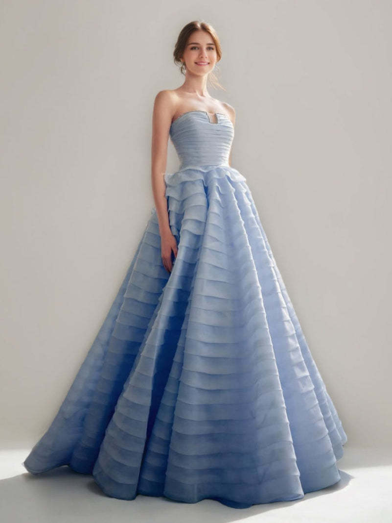 Elegant Strapless Ball Gown with Tiered Floor-Length Design and Lace-up Crystals