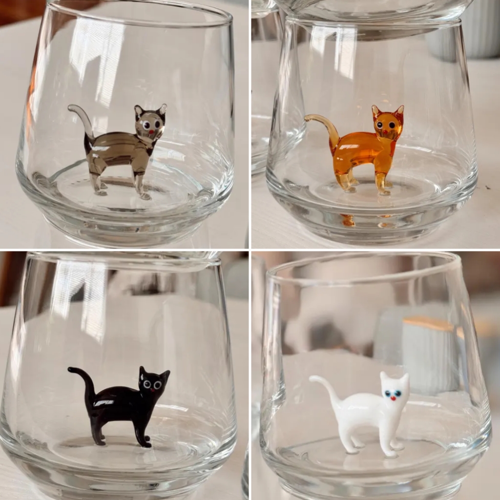 Drinking Glass with Cat Figurine